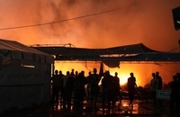 تصاویری از آتش‌سوزی چادرهای آوارگان در نتیجه حمله رژیم اسرائیل (9)