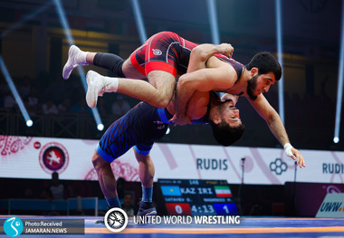 تجلیل از قهرمان کشتی جهان با قابلمه!