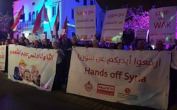 تصاویر/ تظاهرات اعراب ساکن فلسطین اشغالی علیه تجاوز به سوریه