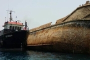لاشه کشتی مغروق از کانال بندر بوشهر خارج شد