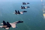 چین و آمریکا جنگنده های خود را در دریای جنوبی به پرواز در آوردند 