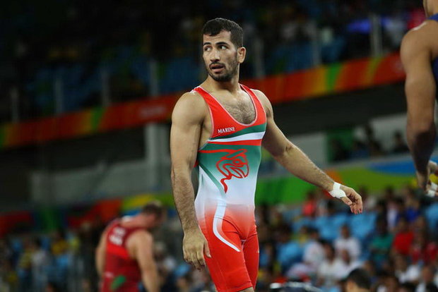 امیدنوروزی: تا المپیک بعدی کشتی می‌گیرم

