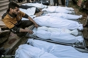 خاکسپاری گروهی بیش از 100 شهید در بیمارستان بزرگ غزه + فیلم