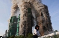 تصاویری از آتش‌سوزی گسترده در هنگ کنگ  (5)