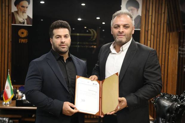 قهرمان المپیک در فدراسیون وزنه برداری سمت گرفت